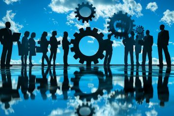 group-people-stand-front-blue-sky-with-gears-gears